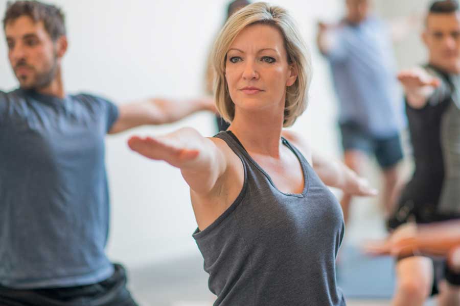 Woman practising Forest Yoga